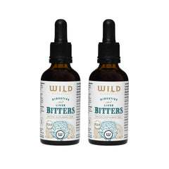 Two amber glass dropper bottles of Digestive and Liver Bitters side by side on a white background.