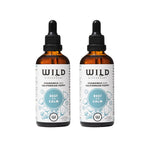 Two amber glass dropper bottles of Rest and Calm on a white background.