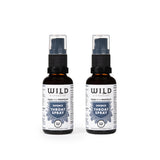 Two amber spray bottles of Throat Spray with white labels and blue accents, shown side-by-side on a white background.