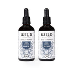 Two amber glass dropper bottles of Vira Defence Elixir with black droppers and white labels, shown side by side on a white background.